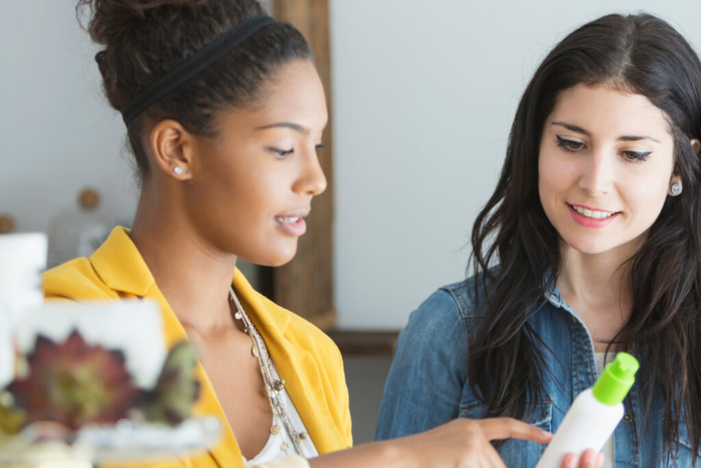 Two young women launch their careers through a retail job in the service industry